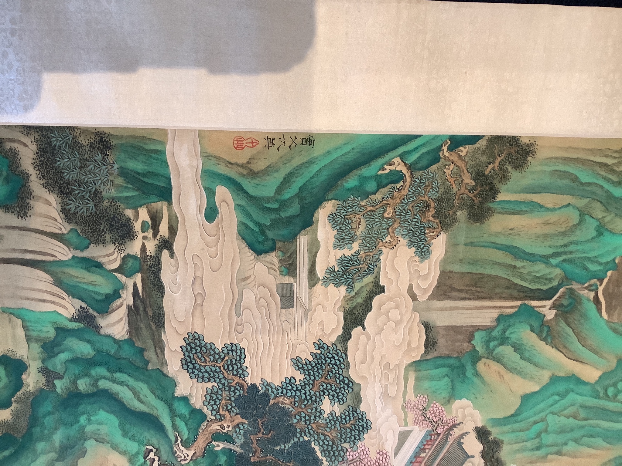 A Chinese scroll painting on silk of pavilions amid rocks and trees, 20th century, Image 91.5 cm X 50 cm